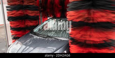 detail view on car wash, car wash foam water, Automatic car wash in action Stock Photo