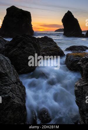 Sunset at a Rocky Beach, Northern California Coast Stock Photo