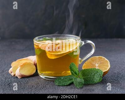 Herbal tea with ginger, mint and lemon Stock Photo