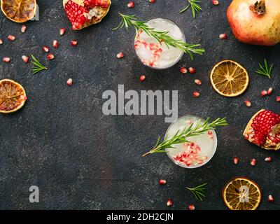 White sangria with rosemary, pomegrante and lemon juice Stock Photo