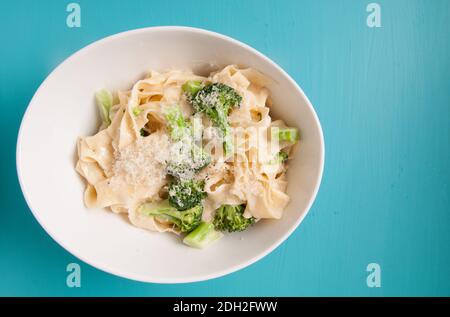 tagliatelle alfredo primavera, creamy sauce with vegetables and home made pasta Stock Photo