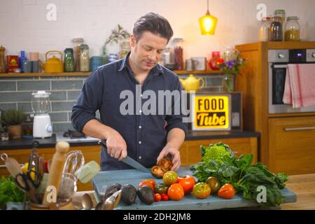 United Kingdom / London / Jamie Oliver/ Jamie Oliver,english celebrity chef, restauranteur cooking for his ,food tube channel in London Stock Photo