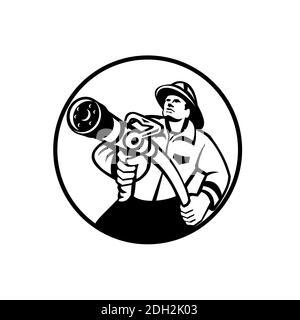 Fireman Firefighter Aiming Fire Hose Rosette Stock Photo - Alamy