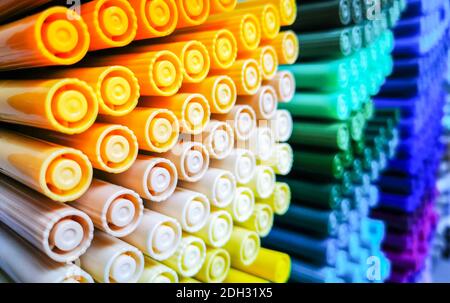 Creativity: Colored pencils in a stationary shop, close up Stock Photo