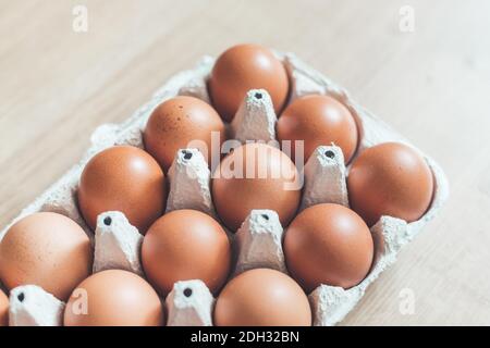 Eggs in a basket for morning breakfast or baking a cake, top view. Stock Photo