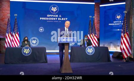 United States President-elect Joe Biden delivers remarks introducing retired US Army four-star General Lloyd J. Austin III, as his nominee to serve as the 28th US Secretary of Defense from the Queen Theatre in Wilmington, Delaware on Wednesday, December 9, 2020. US Vice President-elect Kamala Harris looks on from left and Gen. Austin looks on from right.Credit: Biden Transition via CNP | usage worldwide Stock Photo