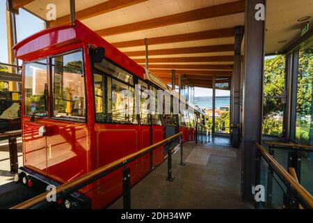 WELLINGTON, NEW ZEALAND - Feb 25, 2020: Wellington's iconic Cable Car waiting at the Kelburn Terminus. The cable car or funicular railway is a popular Stock Photo