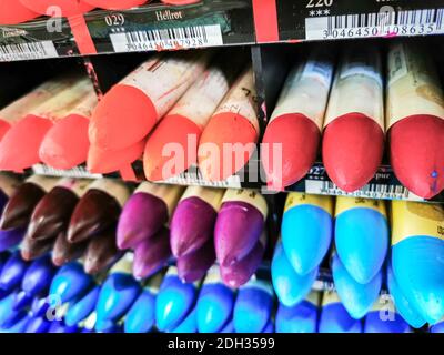 Creativity: Colored pencils in a stationary shop, close up Stock Photo