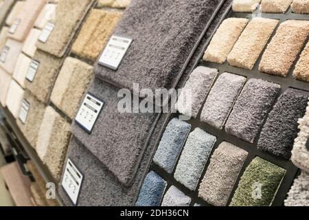Wide variety of carpet samples displayed in a home improvement store during daylight Stock Photo