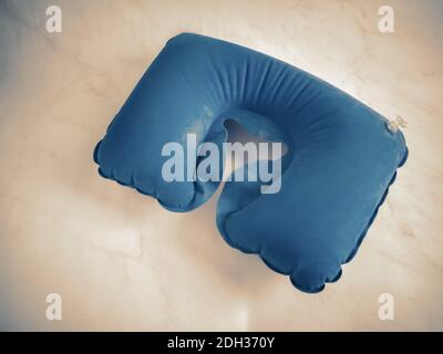 Blue inflatable pillow for comfortable neck position Stock Photo
