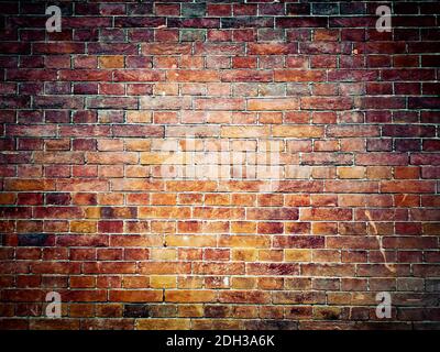 Brick wall background. Brown and red bricks, masonry texture of a building exterior Stock Photo
