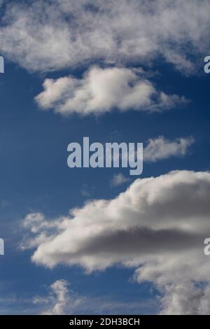 Cumulus clouds filled with moisture float over the American Southwest. Stock Photo