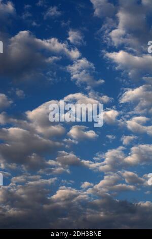 Cumulus clouds filled with moisture float over the American Southwest. Stock Photo