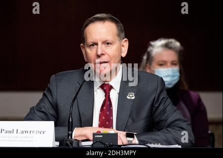 Washington, DC, USA. 9th Dec, 2020. December 9, 2020 - Washington, DC, United States: Dr. PAUL R. LAWRENCE, Under Secretary for Benefits, Veterans Benefits Administration, U.S. Department of Veterans Affairs, speaking at a hearing of the Senate Veterans Affairs Committee. Credit: Michael Brochstein/ZUMA Wire/Alamy Live News Stock Photo