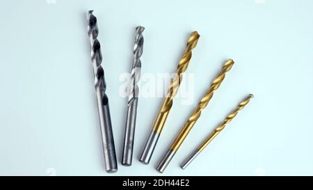 Set of metal drills on a white background Stock Photo