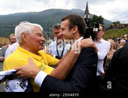 French President (R) Emmanuel Macron speaks with former French cyclist Raymond Poulidor on July 19, 2017, in Saint-Martin-d'Arc, as he arrives to meet former cyclists during the 183 km seventeenth stage of the 104th edition of the Tour de France cycling race between Le La Mure and Serre-Chevalier, French Alps. Photo by Jean-Pierre Clatot/Pool/ABACAPRESS.COM Stock Photo