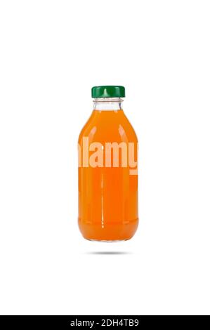 carrot juice in a closed glass bottle with a green cap isolate Stock Photo