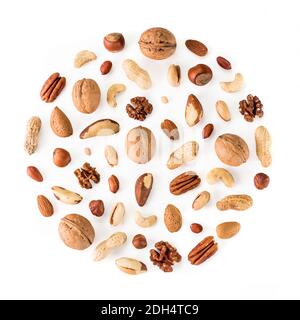 Pattern of nuts in circle form isolated on whie Stock Photo