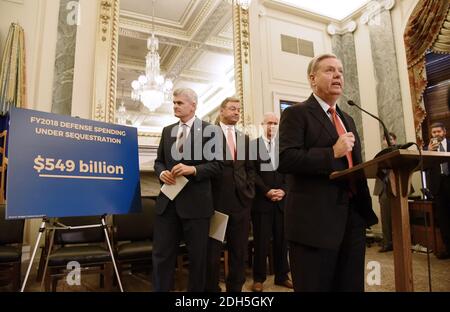 U.S. Sen. Lindsey Graham (R-SC) speaks as Sen. Bill Cassidy (R-LA) , Sen. Dean Heller (R-NV), Sen. Ron Johnson (R-WI) listen during a news conference on health care September 13, 2017 on Capitol Hill in Washington, DC. . Photo by Olivier Douliery/ Abaca Stock Photo