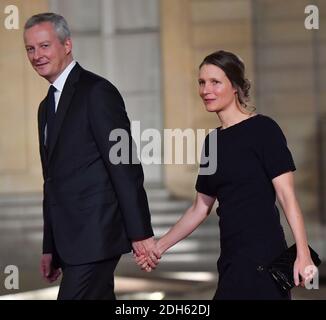 Bruno Le Maire and wife Pauline Doussau de Bazignan arriving for a state dinner honoring Lebanese President Aoun at the Elysee palace in Paris, France, September 25, 2017. Photo by Christian Liewig/ABACAPRESS.COM Stock Photo