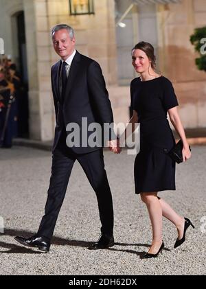 Bruno Le Maire and wife Pauline Doussau de Bazignan arriving for a state dinner honoring Lebanese President Aoun at the Elysee palace in Paris, France, September 25, 2017. Photo by Christian Liewig/ABACAPRESS.COM Stock Photo