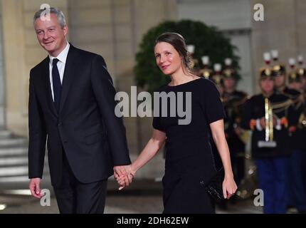 Bruno Le Maire and wife Pauline Doussau de Bazignan arriving for a state dinner honoring Lebanese President Aoun at the Elysee palace in Paris, France, September 25, 2017. Photo by Christian Liewig/ABACAPRESS.COM Stock Photo