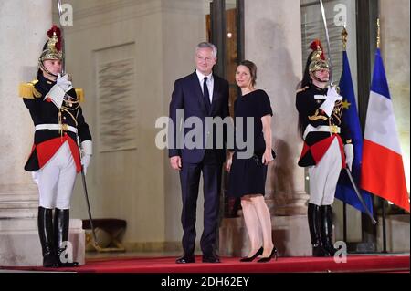 Bruno Le Maire and wife Pauline Doussau de Bazignan arriving for a state dinner honoring Lebanese President Aoun at the Elysee palace in Paris, France, September 25, 2017. Photo by Christian Liewig/ABACAPRESS.COM Stock Photo