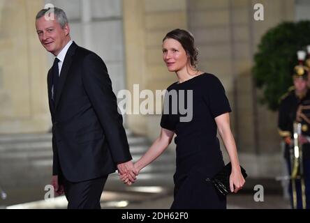 Bruno Le Maire and wife Pauline Doussau de Bazignan arriving for a state dinner honoring Lebanese President Aoun at the Elysee palace in Paris, France, September 25, 2017. Photo by Christian Liewig/ABACAPRESS.COM Stock Photo