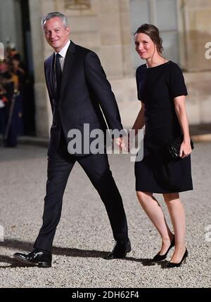 Bruno Le Maire and wife Pauline Doussau de Bazignan arriving for a state dinner honoring Lebanese President Aoun at the Elysee palace in Paris, France, September 25, 2017. Photo by Christian Liewig/ABACAPRESS.COM Stock Photo