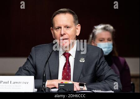 Washington, United States. 09th Dec, 2020. Dr. Paul R. Lawrence, Under Secretary for Benefits, Veterans Benefits Administration, U.S. Department of Veterans Affairs, speaks at a hearing of the Senate Veterans Affairs Committee. Credit: SOPA Images Limited/Alamy Live News Stock Photo