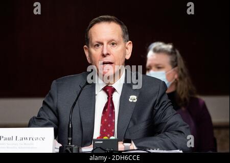 Washington, United States. 09th Dec, 2020. Dr. Paul R. Lawrence, Under Secretary for Benefits, Veterans Benefits Administration, U.S. Department of Veterans Affairs, speaks at a hearing of the Senate Veterans Affairs Committee. Credit: SOPA Images Limited/Alamy Live News Stock Photo