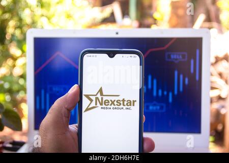 In this photo illustration the Nexstar Media Group logo seen displayed on a smartphone. Stock Photo