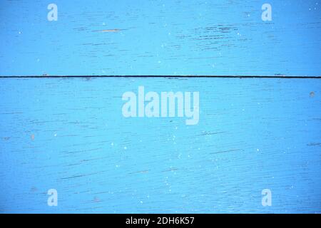 Weathered old wooden background with bright sky blue paint. Wood texture pattern. Stock Photo