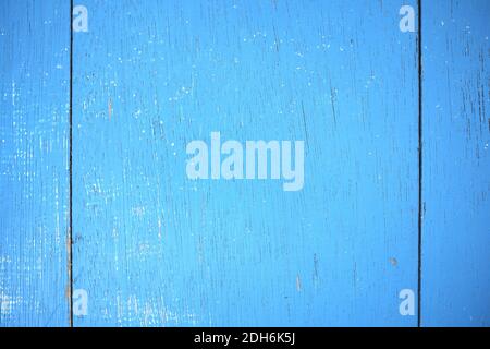 Weathered old wooden background with bright sky blue paint. Wood texture pattern. Stock Photo