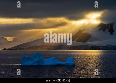 Sunlight breaking through the clouds above the South Atlantic Ocean, Antarctica Stock Photo