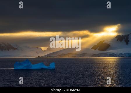 Sunlight breaking through the clouds above the South Atlantic Ocean, Antarctica Stock Photo
