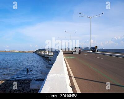 Jakarta, Indonesia - November 13, 2020 : Concrete guardrail bridge connecting the coastal reclamation area Pantai Indah Kapuk, North Jakarta Stock Photo