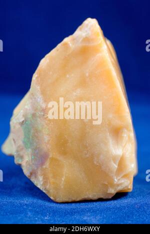 nevada opal, unrefined gemstones stuck in solid rock Stock Photo