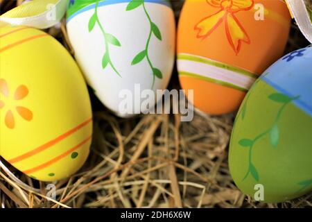 easter eggs in basket on white background Stock Photo