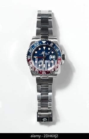 Rolex GMT-Master II, Baselworld 2018 edition with Pepsi red and blue ceramic bezel, on Rolex Oyster bracelet. Wrist watch viewed vertically, isolated Stock Photo