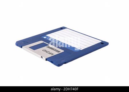 The front of an blue floppy disk, isolated on a white background. Close up Stock Photo