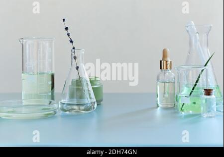 Various bottles on table in laboratory Stock Photo