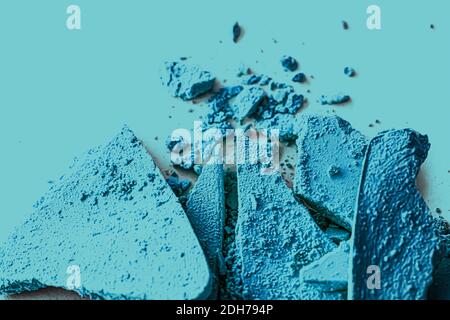 Blue eye shadow powder as makeup palette closeup, crushed cosmetics and beauty texture Stock Photo