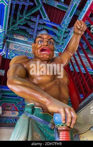 Statue in famous Shaolin Buddhist monastery - China Stock Photo