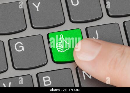 Computer keyboard with thumb key Stock Photo