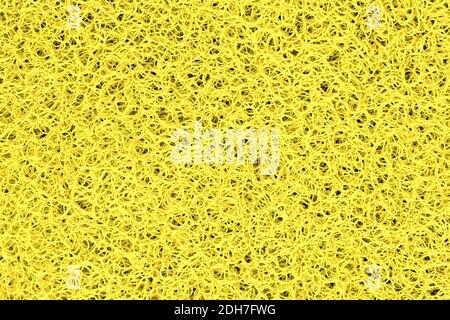 Close-up detail Illuminating yellow color plastic doormat texture. Neutral abstract backdrop surface. Color of the year 2021 Stock Photo