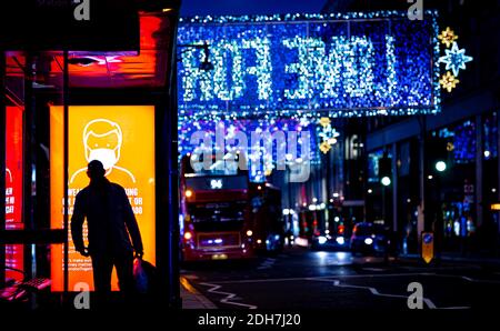 A social poster on Oxford Street, a major road in the City of Westminster in the West End of London, UK Stock Photo