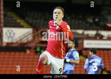 celebration Cauley Woodrow #9 of Barnsley celebrates his goal to make it 2-1 Stock Photo