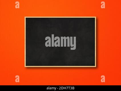 Traditional black board isolated on a red background Stock Photo