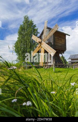 Wooden windmill in the village of Mandrogi Russia Stock Photo